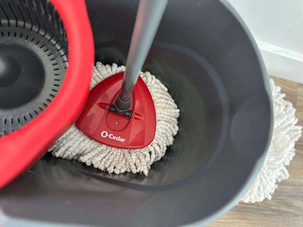 up close image of ocedar mop and bucket.